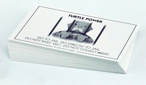 Carte caisse de communauté du Monopoly Tortues Ninja - Teenage Mutant Ninja Turtles