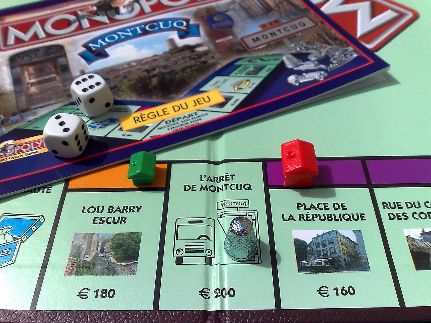 Détails du plateau de jeu du Monopoly Montcuq